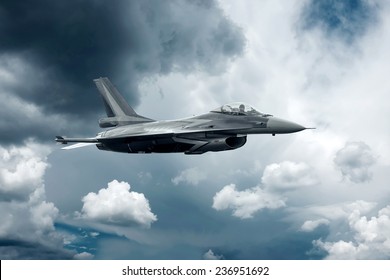 Military airplane at flying on the speed - Powered by Shutterstock