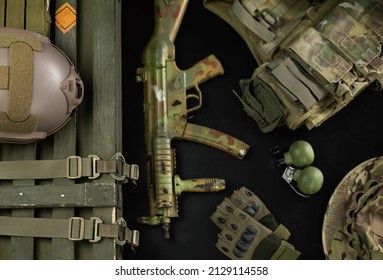 Military Ammunition Top View Of A Grenade Box, Rifle, Grenades, Bulletproof Vest, Helmet And Other Tactical Items