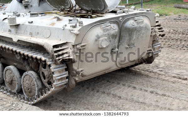 Military\
armored personnel carrier, armored\
vehicle.