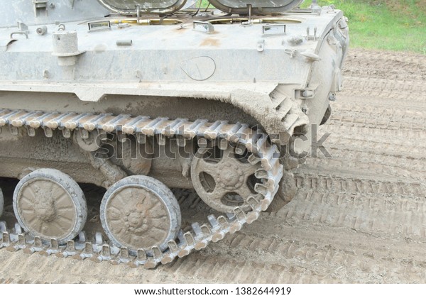 Military\
armored personnel carrier, armored\
vehicle.