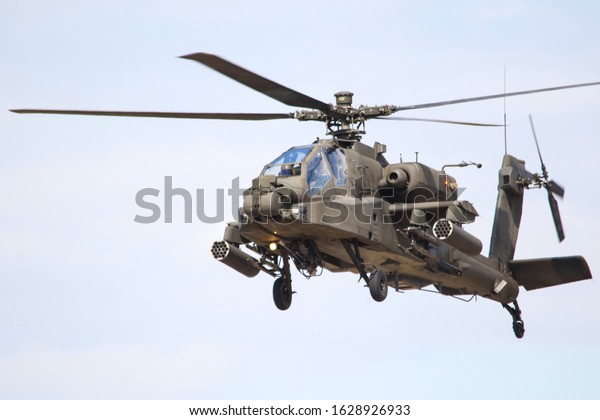 Military\
attack helicopter in the air. Athens air\
show.
