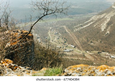 Military Base In Bakhchisarai. Secret Military Base A Top View. Military Unit In Crimea, Russia. Tanks, Armored Personnel Carriers,guns. War Zone. Mountainous Landscape. Military Unit In The Mountains