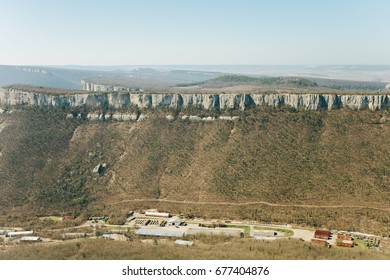 Military Base In Bakhchisarai. Secret Military Base A Top View. Military Unit In Crimea, Russia. Tanks, Armored Personnel Carriers,guns. War Zone. Mountainous Landscape. Military Unit In The Mountains