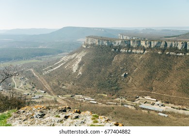 Military Base In Bakhchisarai. Secret Military Base A Top View. Military Unit In Crimea, Russia. Tanks, Armored Personnel Carriers,guns. War Zone. Mountainous Landscape. Military Unit In The Mountains