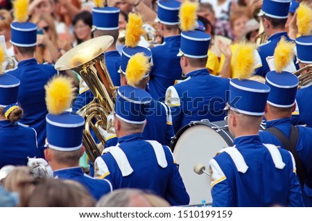 military brass band parade, drummers and brass band in uniform performing