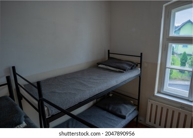 Military Bunk Beds Lined With Gray Ends