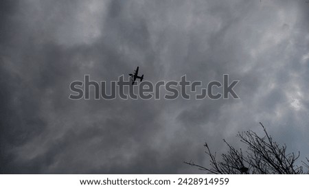 Military Cargo Plane Flying in Closed Air