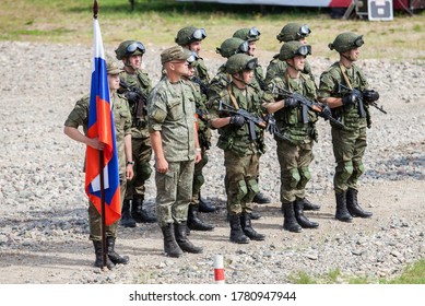 Military Competition ARMY2018 A Platoon Of Russian Army Soldiers With The Flag Of The Russian Federation Dressed In A Warrior Uniform. Pesochnoye Village, Kostroma Region, Russia - June 10, 2018.