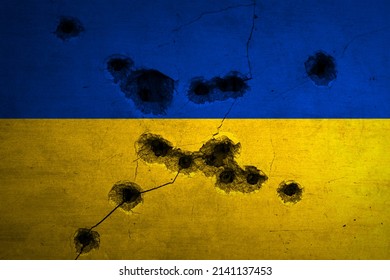 Military Conflict In Ukraine Background. Flag With Bullet Holes And Crack On Concrete Wall. Russian Aggression Concept