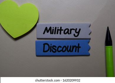 Military Discount Write On A Sticky Note Isolated On Office Desk.