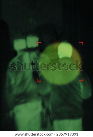 Military, enemy and target in night vision, overlay or dark green silhouette of spy, agent or terrorist risk to soldier. Police, surveillance and security people in infrared scope for army mission
