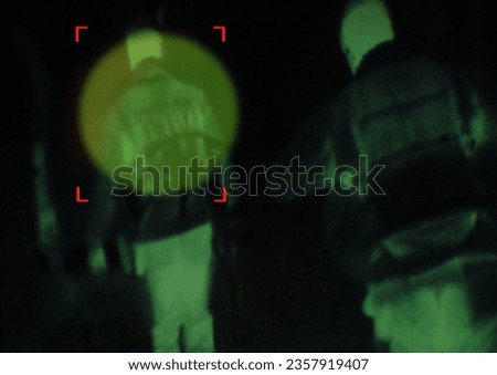 Military, enemy and target in night vision, overlay or dark green silhouette of spy, agent or terrorist risk to soldier. Police, surveillance and people in infrared security scope for army mission