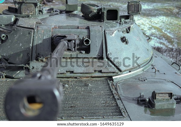 Military equipment,\
tank with a gun and\
gun