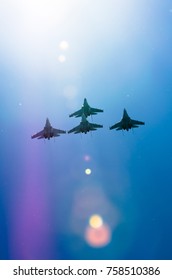 Military Fighter Jet Plane Above The Clouds Sun Glare