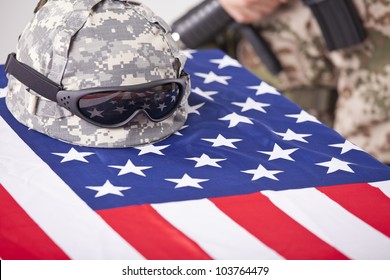 Military Funeral - Helmet On The American Flag And Soldier In The Background