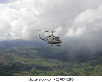 Military Helicopter Flying Over Colombian Jungle