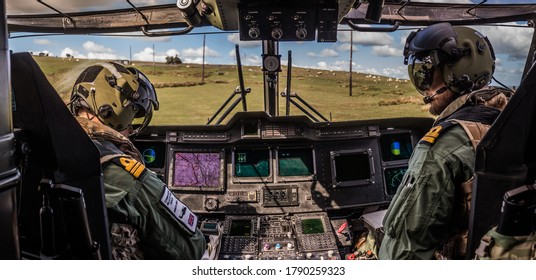 Military Helicopter Merlin EH101 Cockpit On A Training Mission.