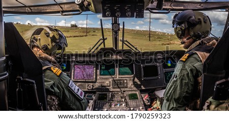 Military Helicopter Merlin EH101 cockpit on a training mission.