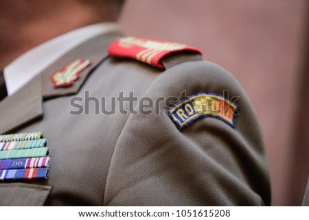 Military insignia on the uniform of a Romanian Army officer