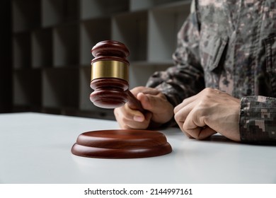 Military Law Concept, Hand Of Soldier Holding Gavel