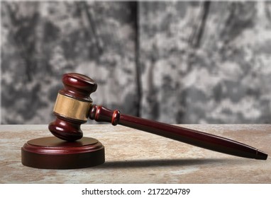 Military Law Concept, Soldier And Wooden Gavel At Courtroom.