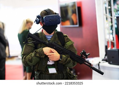 A Military Man In 3D Glasses With A Model Of A Firearm. Combat Training Using Modern Computer Technology. Unrecognizable Person