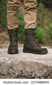 Military Man In Dark Green Leather Tactical Boots