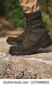 Military Man In Dark Green Leather Tactical Boots