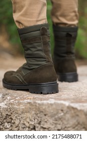 Military Man In Dark Green Leather Tactical Boots