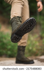 Military Man In Dark Green Leather Tactical Boots