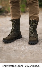 Military Man In Dark Green Leather Tactical Boots