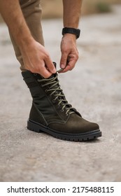 Military Man In Dark Green Leather Tactical Boots