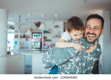 Military Man Father Hugs Son. Portrait Of Happy American Family. Happy American Family, Father With Son. Happy Male Soldier Dad Reunited With Son After US Army