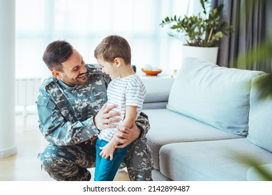 Military Man Father Hugs Son. Portrait Of Happy American Family. Happy American Family, Father With Son. Happy Male Soldier Dad Reunited With Son After US Army