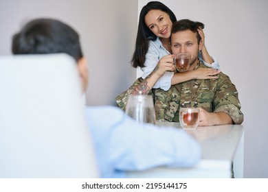 Military Man With His Wife And Son For Morning Tea