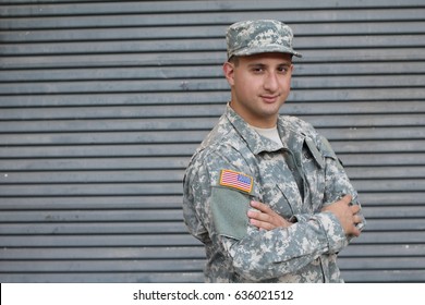 Military Man Isolated On Gray Background