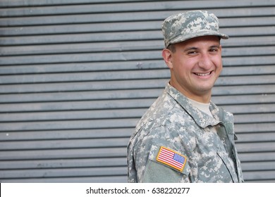 Military Man Isolated On Gray Background