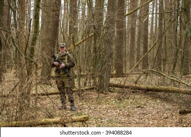 Military man with Kalashnikov rifle outdoor forest - Shutterstock ID 394088284