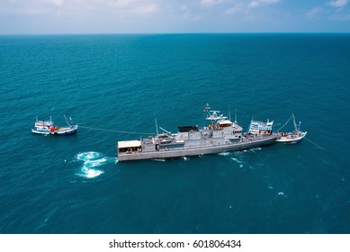 Military Navy Ships In A Sea Bay With Fishing Boat,view From Aerial