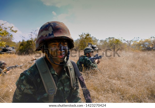 Military operation training with army tanks,\
guns, army cars in battlefield in Pakchong, Nakhonratchasima,\
Thailand taken on\
03/3/2018