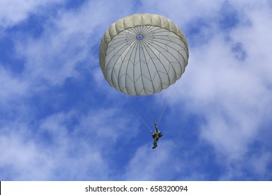  Military Parachute Jumper  On Blue Sky Background