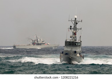 Military Patrol Boats Entering Port.