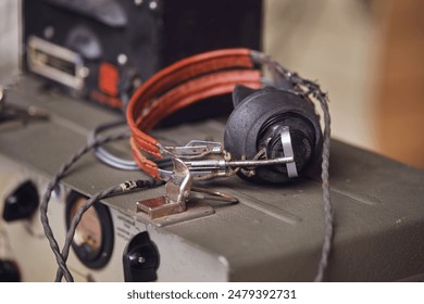 Military radio with headphones during the Second World War. Historical items from the times of the Soviet Union