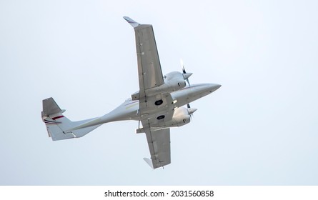 Military Reconnaissance Aircraft, Twin-engine, Single, On A Background Of Sky. Close-up.