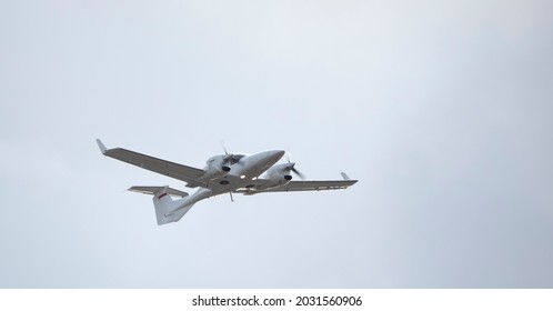 Military Reconnaissance Aircraft, Twin-engine, Single, On A Background Of Sky. Close-up.