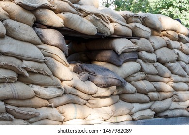Military reinforcement sandbags with loopholes.