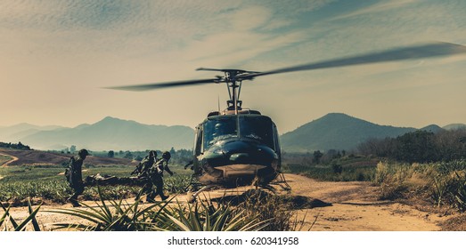 Military Rescue Czech Army Helicopter , United States Paratroopers Airborne Infantrymen In The Desert Rescuing Their Brother