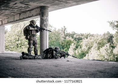 Military Snipers Took A Firing Position In The Destroyed, Abandoned Building Of The City. Urban Warfare, Urban Warfare
