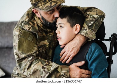 Military Soldier Hugging His Son With Disability At Home - Family Moments And War Concept - Focus On Boy Eye