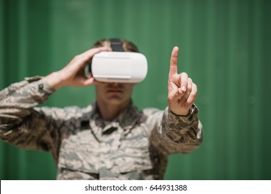 Military Soldier Using Virtual Reality Headset In Boot Camp